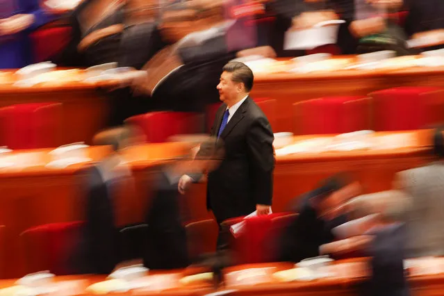 Chinese President Xi Jinping leaves after the opening session of the Chinese People's Political Consultative Conference (CPPCC) at the Great Hall of the People in Beijing, China on March 3, 2018. (Photo by Damir Sagolj/Reuters)