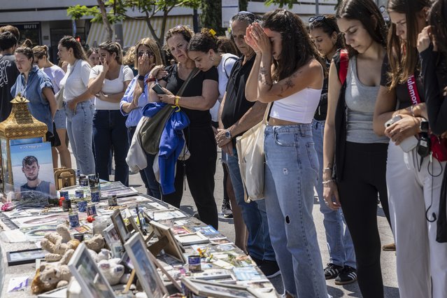 Israelis visit a memorial site for the victims killed and kidnapped by Hamas, during Israel's annual Memorial Day for fallen soldiers and victims of nationalistic attacks, in Tel Aviv, Israel, on Monday, May 13, 2024. Israel marks its annual Memorial Day under the shadow of the October 7 attacks, the ongoing hostage situation and the war in Gaza. (Photo by Heidi Levine for The Washington Post)