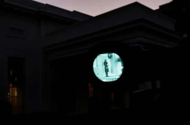 A marine stands outside of the West Wing, signaling that U.S. President Trump is in the Oval Office at the White House as the Electoral College submitted its votes across the country, making Joe Biden the official U.S. President-elect in Washington, US, U.S., December 14, 2020. (Photo by Leah Millis/Reuters)