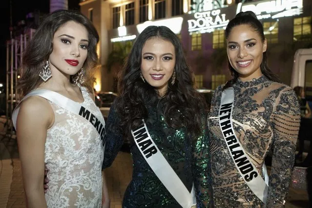 Miss Mexico 2014 Josselyn Garciglia (L), Miss Myanmar 2014 Sharr Eaindra and Miss Netherlands 2014 Yasmin Verheijen pose during the Miss Universe Welcome Event at Downtown Doral Park in Miami in this January 9, 2015 handout photo provided by the Miss Universe Organization. (Photo by Richard D. Salyer/Reuters/Miss Universe Organization)