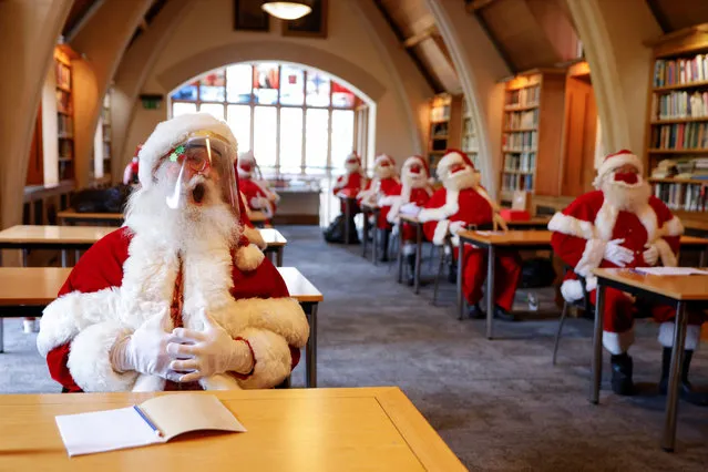 Attendees of the Ministry of Fun Santa School are seen wearing protective visors and face masks during the class, in London, Britain on August 24 2020. (Photo by John Sibley/Reuters)