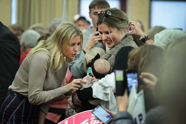 Ivanka Trump (L), the daughter of Republican presidential candidate Donald Trump, greets guests while making a campaign stop for her father on October 20, 2016 in Wauwatosa, Wisconsin. Ivanka had two campaign stops scheduled in Wisconsin today after spending last night in Las Vegas supporting her father as he debated Democratic rival Hillary Clinton. (Photo by Scott Olson/Getty Images)
