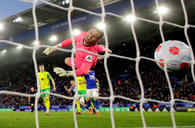 Angus Gunn of Norwich City fails to save the Leicester City first goal scored by Jamie Vardy during the Premier League match between Leicester City and Norwich City at The King Power Stadium on May 11, 2022 in Leicester, England. (Photo by David Klein/Reuters)