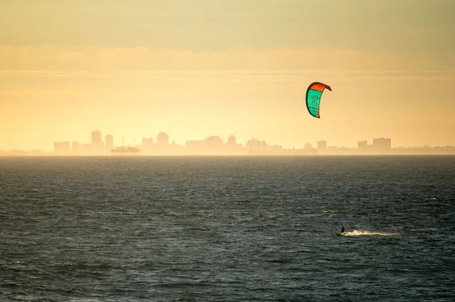 Madison Bell, eight, from Georgia won second place in the Wild Vacation category in the US with this picture of a kite surfer. (Photo by Madison Bell/National Geographic)