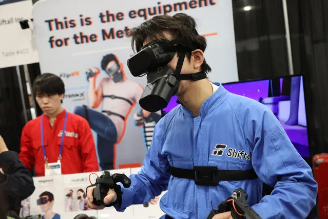 An exhibitor demonstrates various VR accessories by Shiftall, including the Mutalk, a soundproof bluetooth enabled microphone, during the 2024 International CES, at the Mandalay Bay Convention Center in Las Vegas, Nevada on Sunday, January 7, 2024. (Photo by James Atoa/UPI/Rex Features/Shutterstock)