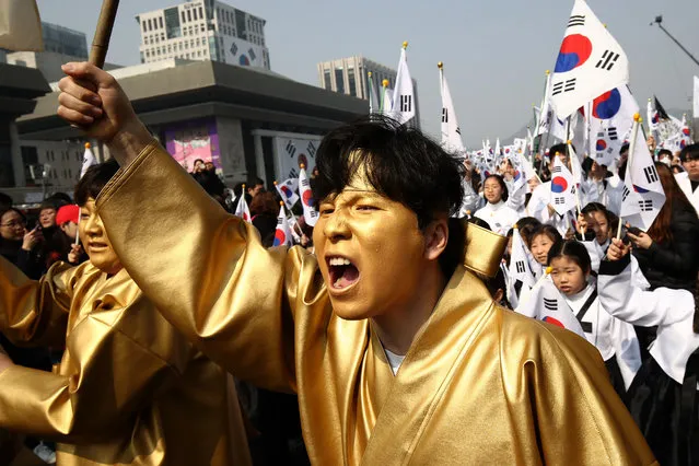 South Korean performers participate in a re-enactment of the historic March First Independence Movement against Japanese during the 100th Independence Movement Day ceremony on March 01, 2019 in Seoul, South Korea. South Koreans celebrate the public holiday marking the 1919 civilian uprising against Japanese rule, which colonized the Korean peninsula from 1910-1945. (Photo by Chung Sung-Jun/Getty Images)