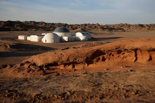 The C-Space Project Mars simulation base is seen at dusk in the Gobi Desert outside Jinchang, Gansu Province, China, April 16, 2019. (Photo by Thomas Peter/Reuters)