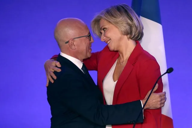 Valerie Pecresse, right, hugs Eric Ciotti at the Conservative party Les Republicains party headquarters after she was chosen as the party's presidential candidate, Saturday, December 4, 2021 in Paris. The head the Paris region, Valerie Pécresse, was facing the hardline lawmaker from Nice, Eric Ciotti in the final round of The Republicans' primary. (Photo byRafael Yaghobzadeh/AP Photo)