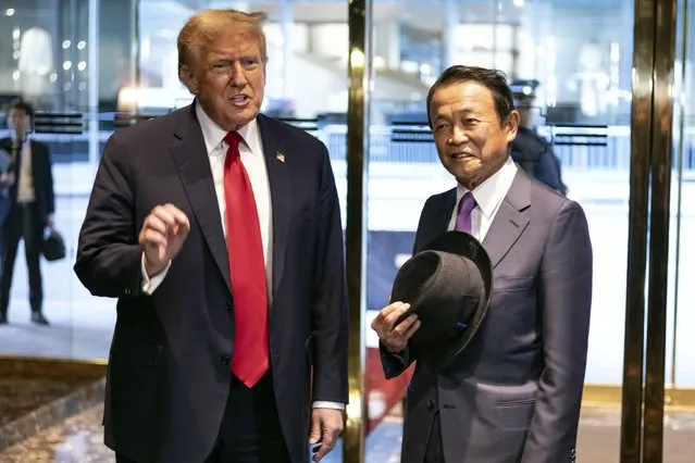Republican presidential candidate former President Donald Trump meets with former Japanese Prime Minister Taro Aso at Trump Tower in midtown Manhattan in New York, Tuesday, April 23, 2024. (Photo by Craig Ruttle/AP Photo)