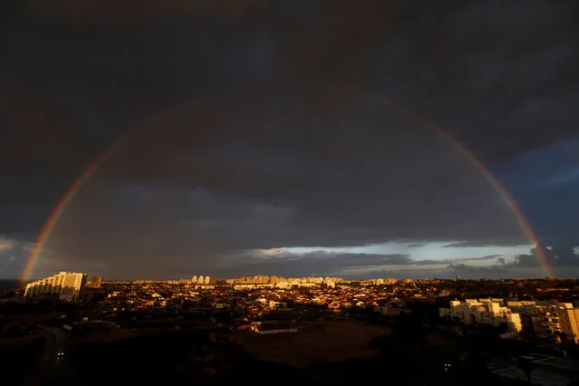 A rainbow is seen over the southern Israeli city of Ashkelon, January 4, 2017. (Photo by Amir Cohen/Reuters)