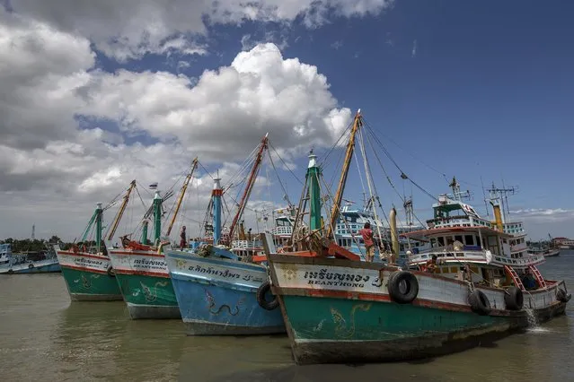 A view of docked fishing vessels after fishing operations stopped at a port in Samut Songkharm province, Thailand, July 1, 2015. (Photo by Athit Perawongmetha/Reuters)