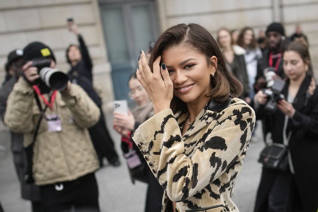 American actress and singer Zendaya departs after Louis Vuitton Fall/Winter 2023-2024 ready-to-wear collection presented Monday, March 6, 2023 in Paris. (Photo by Christophe Ena/AP Photo)