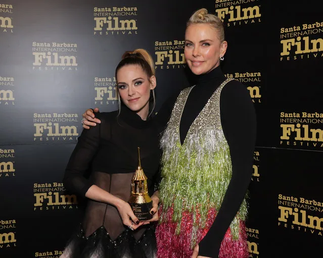 American actresses Kristen Stewart, with her American Riviera Award, and Charlize Theron attend the American Riviera Award tribute during the 37th Annual Santa Barbara International Film Festival at Arlington Theatre on March 04, 2022 in Santa Barbara, California. (Photo by Rebecca Sapp/Getty Images for SBIFF)