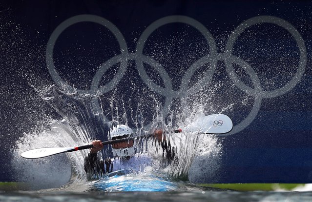 Amir Rezanejad of the Refugee Olympic Team in action during the men's kayak cross time trial on August 2, 2024. (Photo by Molly Darlington/Reuters)