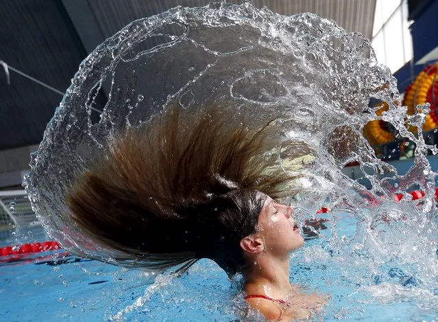 Hungarian swimmer Katinka Hosszu flips her hair at a training session in Budapest, Hungary July 15, 2015. (Photo by Laszlo Balogh/Reuters)