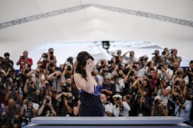 American actress Anne Hathaway poses for photographers at the photo call for the film “Armageddon Time” at the 75th international film festival, Cannes, southern France, Friday, May 20, 2022. (Photo by Daniel ColeAP Photo)