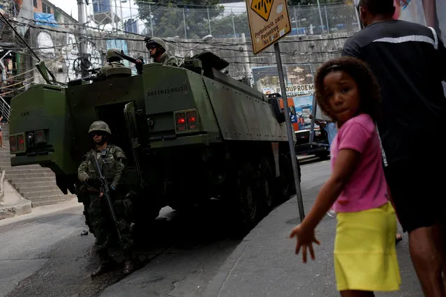 A military vehicle is pictured during an operation after violent clashes between drug gangs in Rocinha slum in Rio de Janeiro, Brazil, September 23, 2017. (Photo by Bruno Kelly/Reuters)