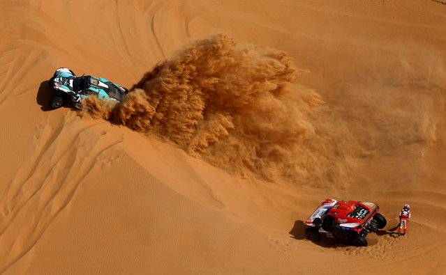MD Rallye Sport's Ludovic Gherardi and Francois Borsotto in action with MD Rallye Sport's Simon Vitse and Max Delfino during stage 11 of the Dakar Rally, on January 16, 2025. (Photo by Hamad I Mohammed/Reuters)