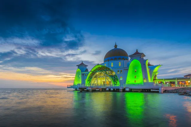 The Malacca Straits Mosque is located on a man-made island in Malaysia. This gorgeous mosque is also called the “Floating Mosque” for an illusion it gives off of sitting right on top of the water. (Photo by Tanatat Pongpibool via Getty Images)