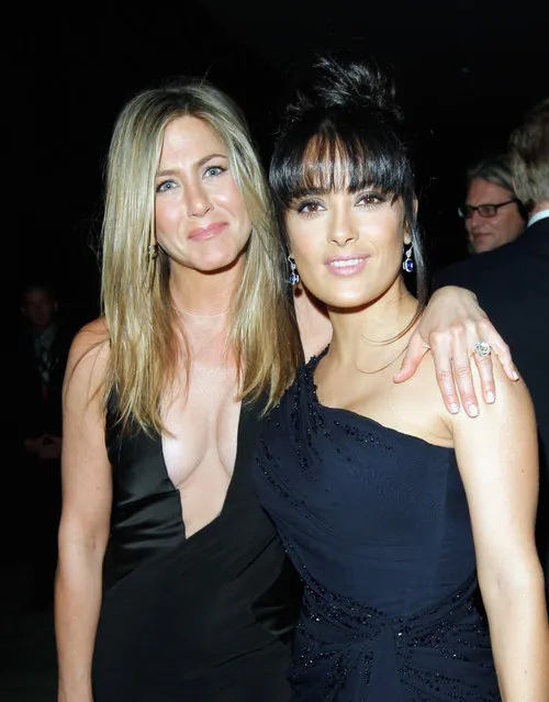 Actresses Jennifer Aniston (L) and Salma Hayek attend LACMA 2012 Art + Film Gala Honoring Ed Ruscha and Stanley Kubrick presented by Gucci at LACMA on October 27, 2012 in Los Angeles, California. (Photo by Donato Sardella)
