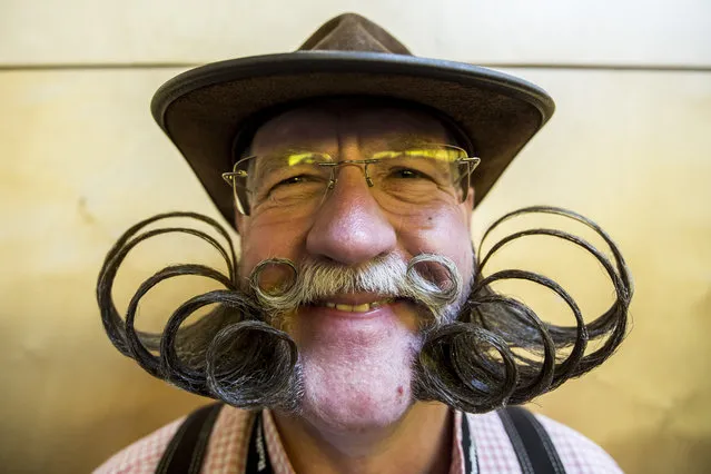 A contestant of the World Beard And Mustache Championships poses for a picture during the Championships 2015 on October 3, 2015 in Leogang, Austria. (Photo by Jan Hetfleisch/Getty Images)