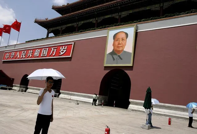 A portrait of Mao Zedong greets visitors at the main entrance to the Forbidden City in Beijing. (Photo by Mark Edelson/The Palm Beach Post)