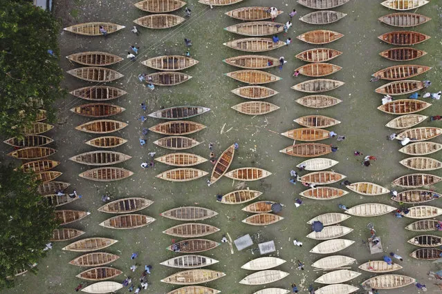 An aerial view shows a traditional wooden boat market in Manikganj on August 19, 2020. (Photo by Munir Uz Zaman/AFP Photo)