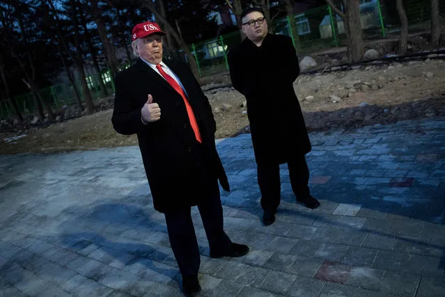 A man impersonating US President Donald Trump (L) and another impersonating Kim Jong- un wait to enter the opening ceremony of the Pyeongchang 2018 Winter Olympic Games at the Pyeongchang Stadium on February 9, 2018. (Photo by Brendan Smialowski/AFP Photo)