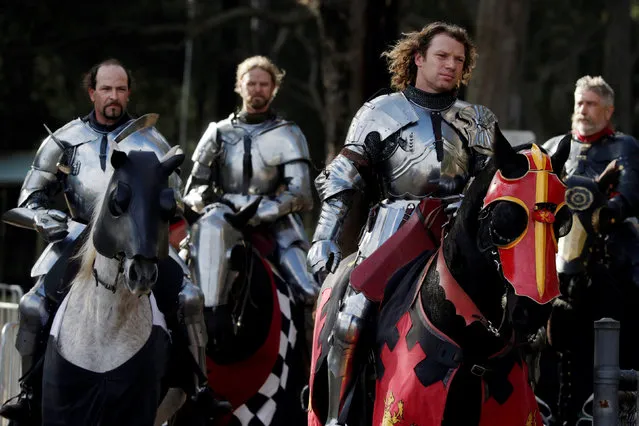 Australian jousting knights (L- 2nd R) Cliff Marisma, Luke Binks, Philip Leitch and New Zealand's Jezz Smith (R) arrive on horseback at the final of the jousting competition the St Ives Medieval Fair in Sydney, one of the largest of its kind in Australia, September 25, 2016. Marisma won the competition. (Photo by Jason Reed/Reuters)