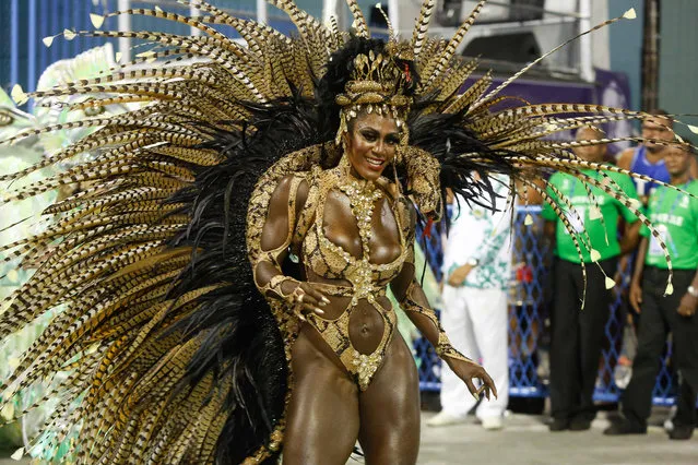A reveller of the Imperatriz Leopoldinense samba-swing school performs during the first night of Rio's Carnival at the Sambadrome in Rio, Brazil, on February 12, 2018. (Photo by Gilson Borba/NurPhoto via Getty Images)