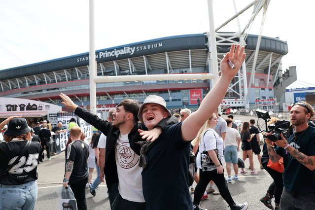 Oasis fans from Caerphilly react ahead of the band's first show in 15 years, outside the Cardiff Principality Stadium in Cardiff, Wales, Britain, on July 4, 2025. (Photo by Suzanne Plunkett/Reuters)