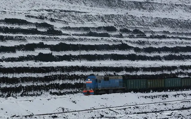 A general view shows a train along coal faces at the Borodinsky opencast colliery near the Siberian town of Borodino, east of Krasnoyarsk, October 27, 2015. (Photo by Ilya Naymushin/Reuters)