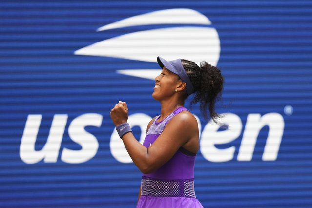 Naomi Osaka, of Japan, celebrates after winning a match against Coco Gauff, of the United States, during the fourth round of the US Open tennis championships, Monday, September 1, 2025, in New York. (Photo by Kirsty Wigglesworth/AP Photo)