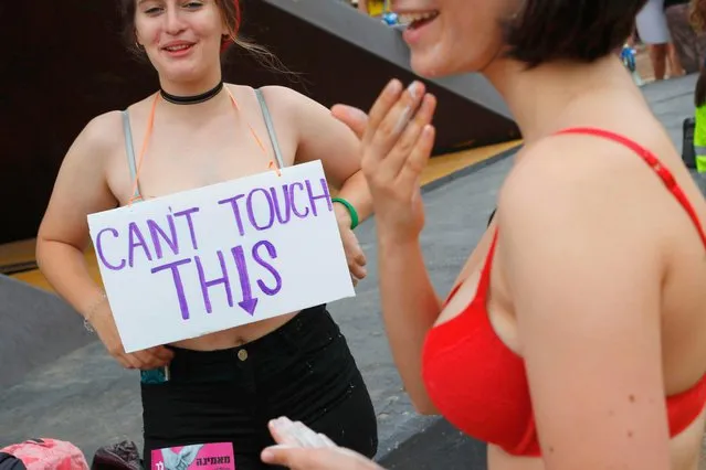 Participants of the annual “SlutWalk” march through the Israeli Mediterranean coastal city of Tel Aviv on May 4, 2018 to protest against rape culture, including sexual assault and harassment directed at women. (Photo by Jack Guez/AFP Photo)