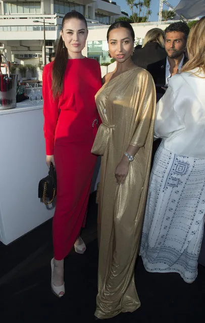 Anastasia Trusova and Golshifteh Farahani attends the Planet Fashion TV and Laurent Perrier Cocktails and Couture Soiree with Transitions Lenses at the 71st international film festival, Cannes, southern France, Saturday, May 12, 2018. (Photo by Planet Fashion TV/AP Images)