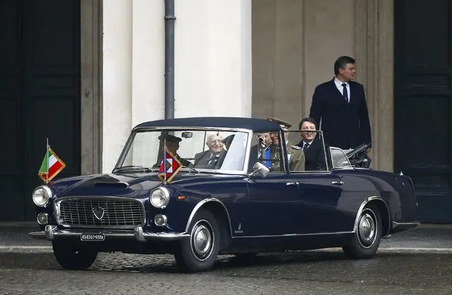 Italy's new President Sergio Mattarella and Prime Minister Matteo Renzi arrive by car for a welcoming ceremony, at the Quirinale presidential palace in Rome, February 3, 2015. (Photo by Tony Gentile/Reuters)