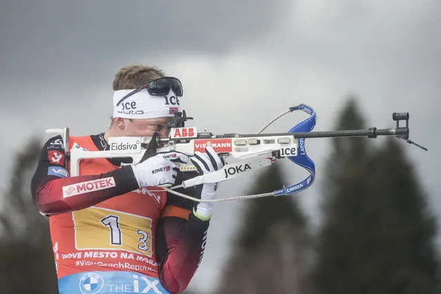 Norway's Tarjei Boe competes at the 4x6 Mixed Relay event at the IBU Biathlon World Cup in Nove Mesto, Czech Republic, on March 14, 2021. Team Norway won the gold medal ahead the Italy's team (silver) and Sweden's Team took the bronze medal. (Photo by Michal Cizek/AFP Photo)