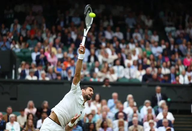 Novak Djokovic of Serbia plays against Jannik Sinner of Italy in the men's singles semifinals at the Wimbledon tennis tournament in London on July 14, 2023. (Photo by Toby Melville/Reuters)
