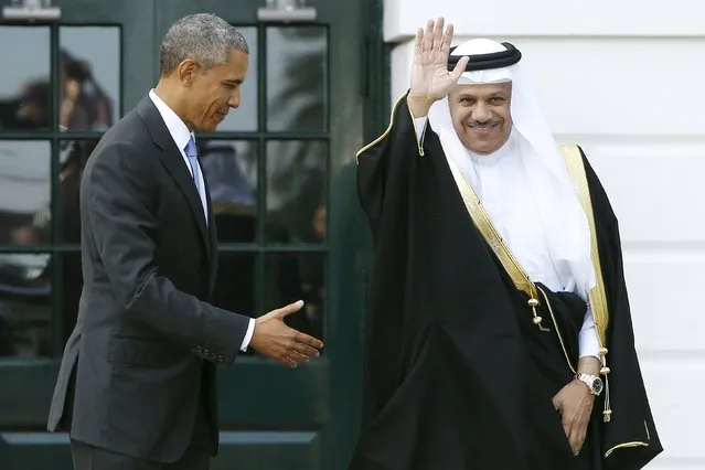 U.S. President Barack Obama welcomes Secretary General of the Gulf Cooperation Council Abdul Latif bin Rashid Al Zayani of Bahrain at the White House in Washington, United States May 13, 2015. (Photo by Jonathan Ernst/Reuters)