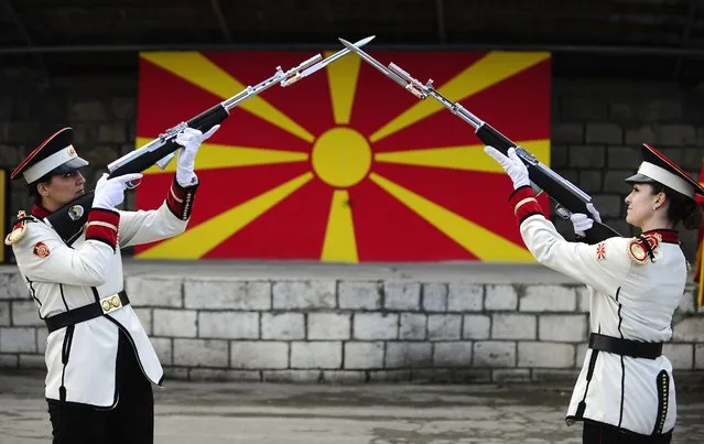 Corporals Verica Zlatevska (L) and Dragana Kitanovska attend an honour guard training session at an army barracks in Skopje March 4, 2015. Macedonia's honour army battalion, the ceremonial uniformed guard that receives every foreign president, dignitaries and delegations, but also sees off and welcomes the head of state every time he leaves the country, has a different glow. For the first time in the history of Macedonia's army, the honour guard has two women in its ranks. There has not been an event in which one of them is not in the first row. Zlatevska joined the army in 2003, Kitanovska in 2006. Picture taken March 4, 2015. REUTERS/Ognen Teofilovski (MACEDONIA - Tags: MILITARY SOCIETY)
