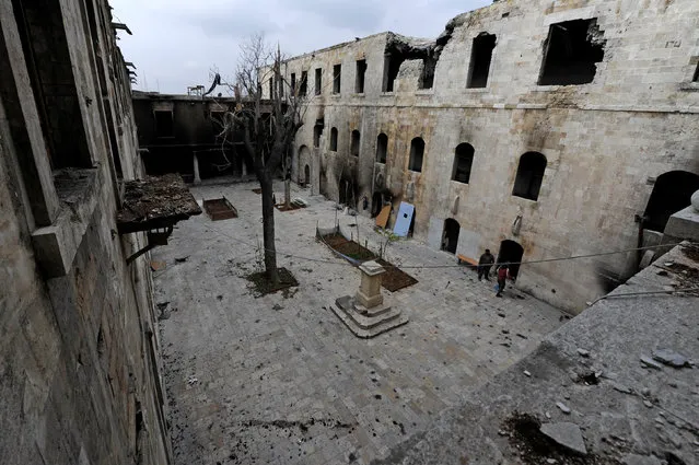A general view shows damage in al-Sheebani school's courtyard, in the Old City of Aleppo, Syria December 17, 2016. (Photo by Omar Sanadiki/Reuters)
