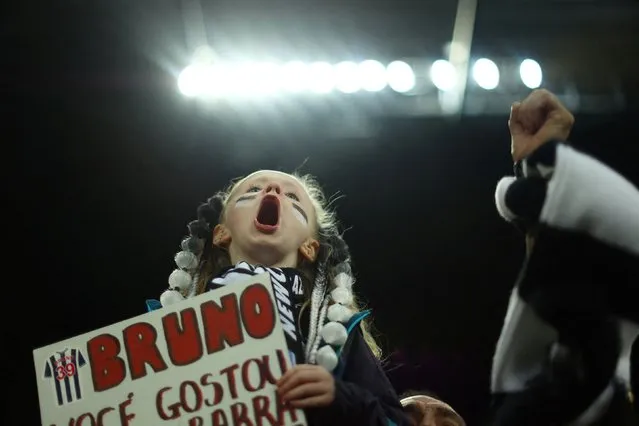 A young Newcastle United fan shows support for midfielder Bruno Guimarães before a Champions League match in Newcastle upon Tyne, England, on Wednesday, October 4, 2023. (Photo by Carl Recine/Reuters)