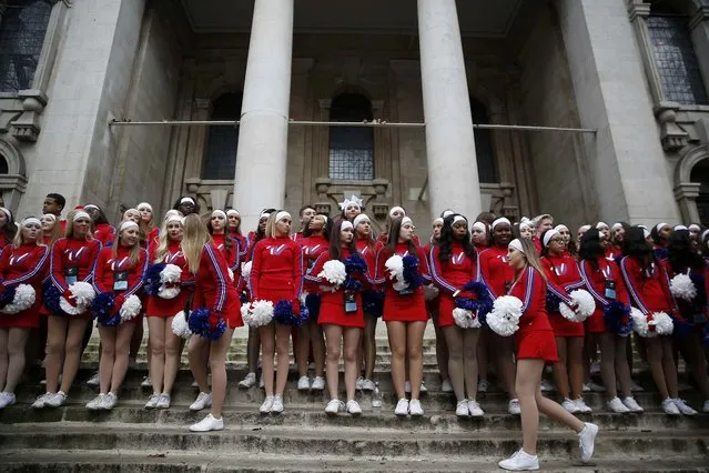 Cheerleaders arrange themselves before the New Year's Day parade in London, Britain January 1, 2017. (Photo by Neil Hall/Reuters)