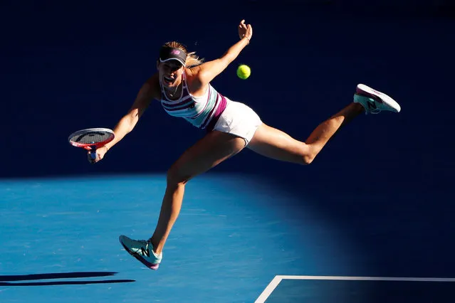 Danielle Collins of the US hits a return against Russia's Anastasia Pavlyuchenkova during their women's singles quarter-final match on day nine of the Australian Open tennis tournament in Melbourne on January 22, 2019. (Photo by Adnan Abidi/Reuters)