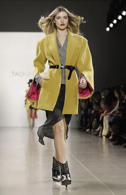 A model presents a creation by Chinese fashion designer Taoray Wang during New York Fashion Week in New York, New York, 09 February 2019. (Photo by Peter Foley/EPA/EFE)