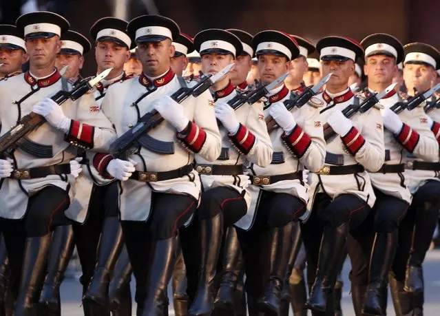 Army honor guard soldiers march during a parade to mark the Independence Day in downtown Skopje, North Macedonia, Wednesday, September 8, 2021. North Macedonia is celebrating Wednesday the 30th anniversary since its independence from former Yugoslavia. (Photo by Boris Grdanoski/AP Photo)