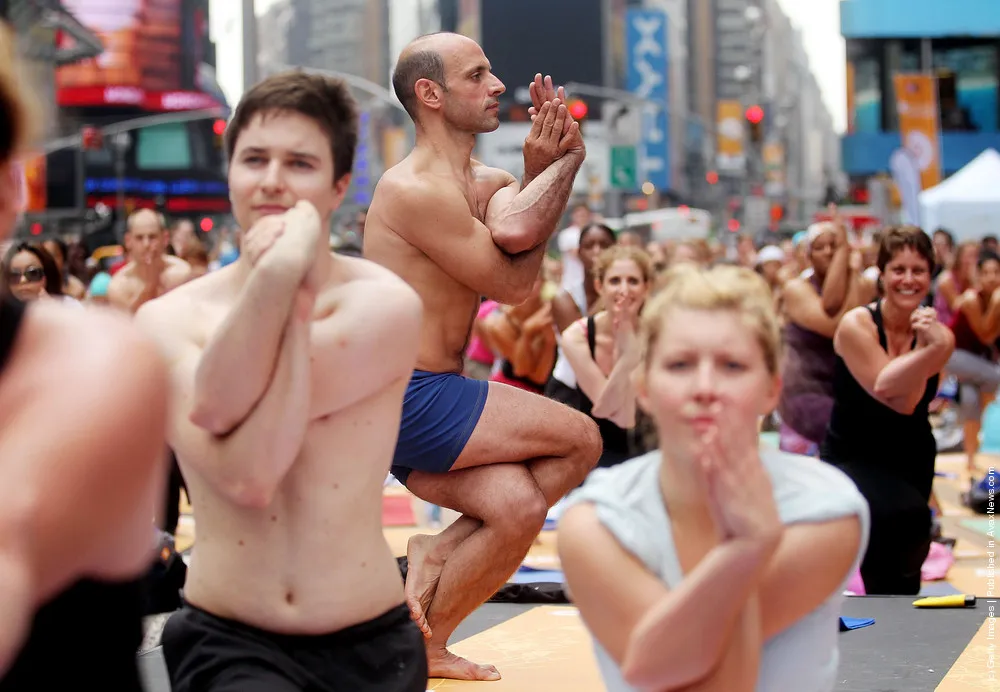 Summer Solstice Marked In Times Square With Mass Yoga Session