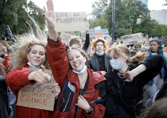 People participate in the Global Climate Strike of the movement Fridays for Future in Warsaw, Poland, September 24, 2021. (Photo by Kacper Pempel/Reuters)