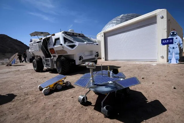 Models of Mars rovers are seen at “Mars Base 1”, a C-Space Project, in the Gobi desert, some 40 kilometres from Jinchang in China's northwest Gansu province on April 17, 2019. Surrounded by barren hills in northwest Gansu province, “Mars Base 1” opened to the public on April 17 with the aim of exposing teens – and soon tourists – to what life could be like on the planet. (Photo by Wang Zhao/AFP Photo)