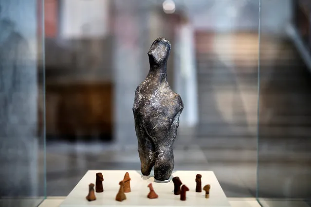 A 7000-year old Neolithic statuette is temporarily displayed at the National Archaeological Museum in Athens, Greece, February 10, 2017. (Photo by Alkis Konstantinidis/Reuters)